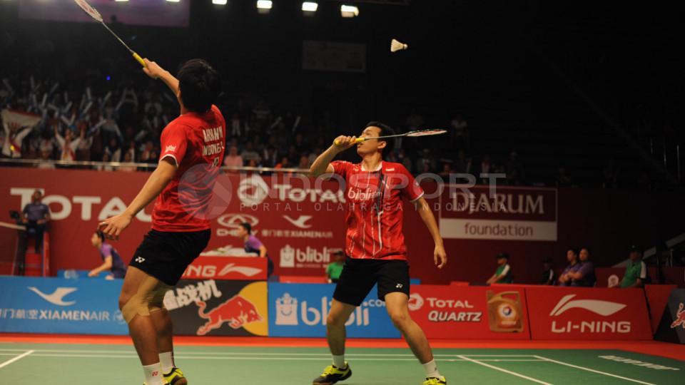 Mohammad Ahsan/Hendra Setiawan susah payah ke babak ketiga setelah dipaksa wakil Prancis Baptiste Careme/Ronan Labar bermain tiga set.